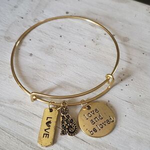 Bracelets by Sandra gold tone adjustable, Love